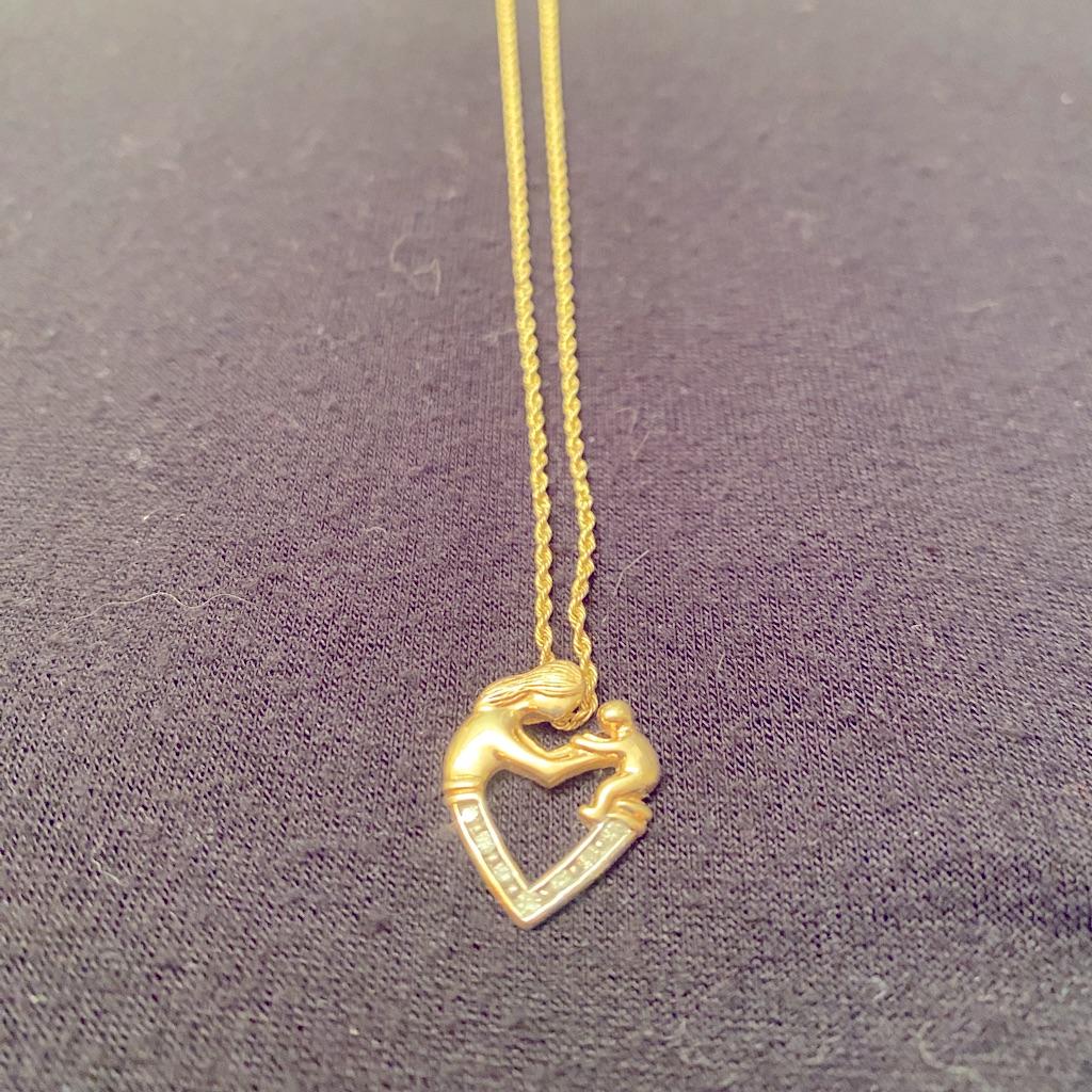 14 K Gold Mother & Child Pendant W Diamond Accent And 20 Inch Chain.